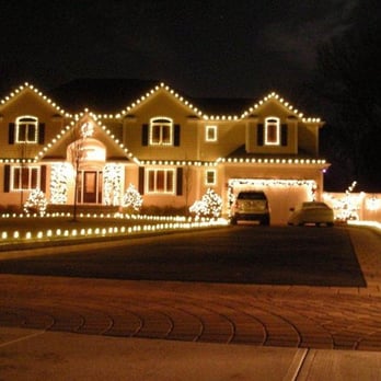 Emerald Magic Lawn Care - a house decorated with christmas lights - Landscaping Near Me - Holtsville, New York Emerald Magic Lawn Care - a house decorated with christmas lights - Landscaping Near Me - Holtsville, New York