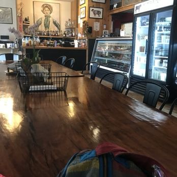 Waimea Butcher Shop - From the end of the long community table.  Separate dining room behind me, with live music - Butcher Near Me - Waimea, Hawaii