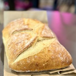 Voila Merci - Uncut sourdough bread to go "la vie en rose OuiOui."