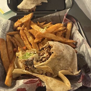 Mugshots Grill & Bar - Philly wrap thrown together. - American Near Me - Birmingham, Alabama Mugshots Grill & Bar - Philly wrap thrown together. - American Near Me - Birmingham, Alabama