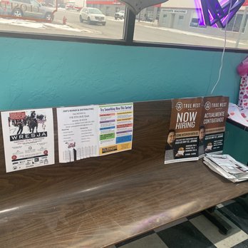 Choate's Family Diner - a wooden bench in front of a window - Breakfast & Brunch Near Me - Jerome, Idaho