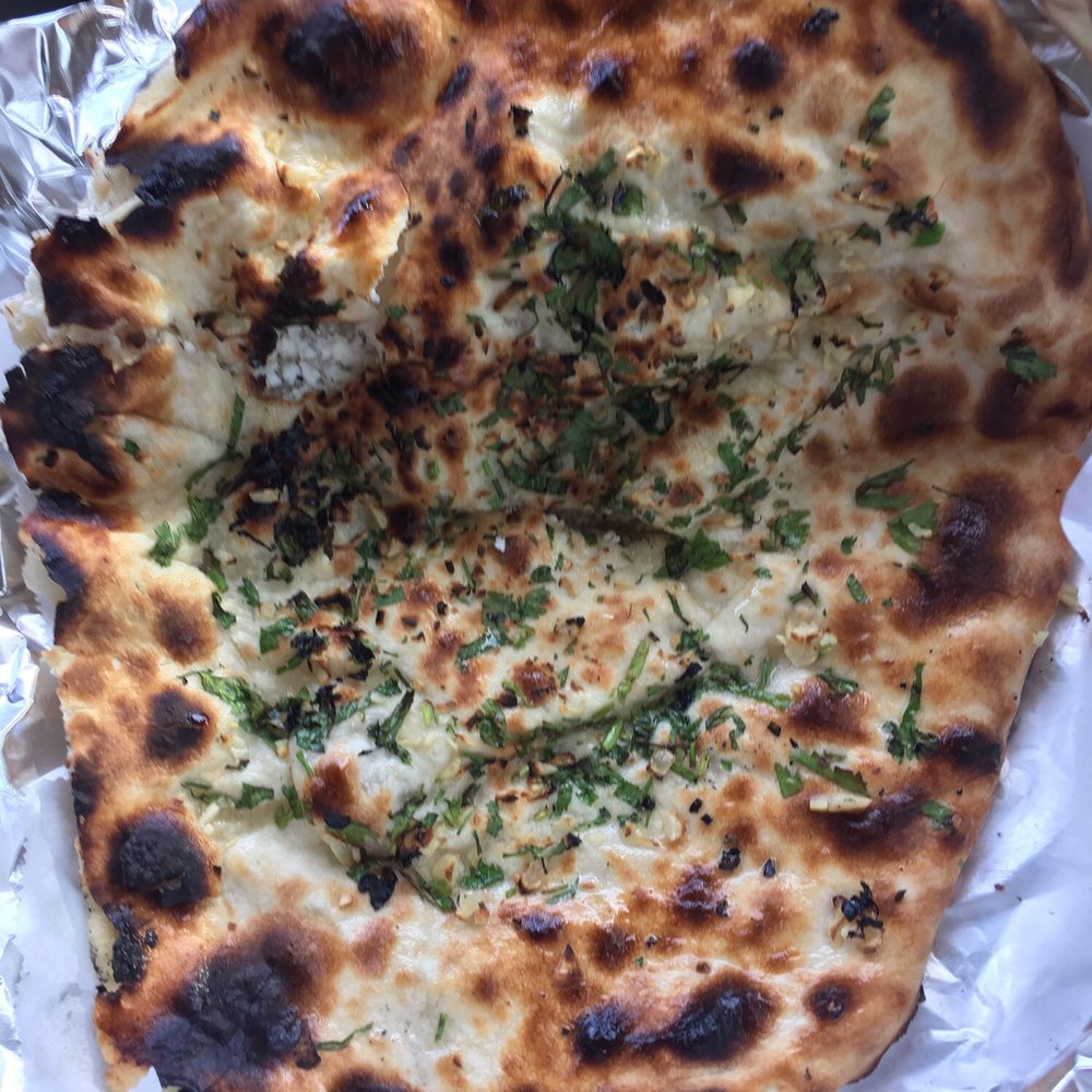 Curry Sultan - Burnt naan raw inside - Indian Near Me - Humble, Texas
