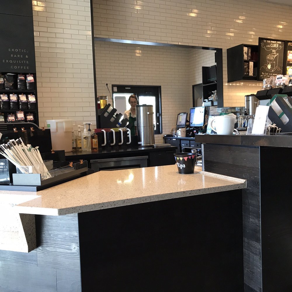 Starbucks - Pick-up counter and a view of the Reserve coffee and drive-thru window. - Coffee & Tea Near Me - Davie, Florida Starbucks - Pick-up counter and a view of the Reserve coffee and drive-thru window. - Coffee & Tea Near Me - Davie, Florida