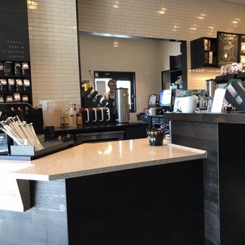 Starbucks - Pick-up counter and a view of the Reserve coffee and drive-thru window. - Coffee & Tea Near Me - Davie, Florida