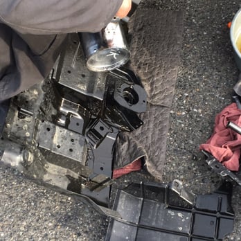 Foothills Toyota - The protective skid plate sort of thing that was holding the left over oil after being dumped in a bucket - Car Dealers Near Me - Burlington, Washington Foothills Toyota - The protective skid plate sort of thing that was holding the left over oil after being dumped in a bucket - Car Dealers Near Me - Burlington, Washington