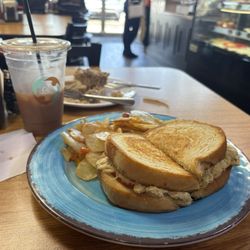 Caffe Connection - This is a tuna melt on sourdough with home fries. I was delicious and a generous portion m.