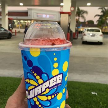 7-Eleven - a hand holding up a cup of watermelon - Convenience Stores Near Me - Anaheim, California 7-Eleven - a hand holding up a cup of watermelon - Convenience Stores Near Me - Anaheim, California