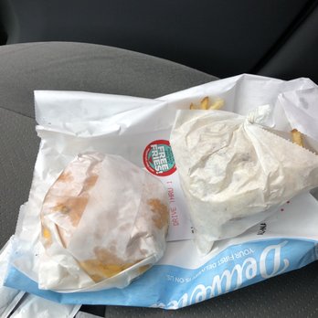 P. Terry's Burger Stand - Unwrapping of double burger and fries. - Fast Food Near Me - Austin, Texas P. Terry's Burger Stand - Unwrapping of double burger and fries. - Fast Food Near Me - Austin, Texas