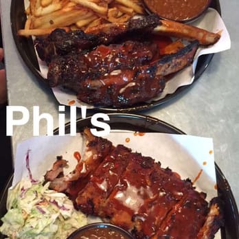 Phil's BBQ - beefy ribs (3) w/ fries and beans and a half a rack of ribs w/ coleslaw and beans - Barbeque Near Me - Santee, California