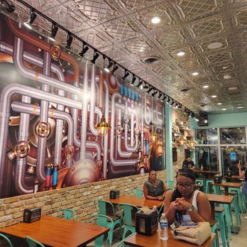 Spiked Rich Nitrogen Ice Cream - Inside view seating area - Ice Cream & Frozen Yogurt Near Me - Doral, Florida Spiked Rich Nitrogen Ice Cream - Inside view seating area - Ice Cream & Frozen Yogurt Near Me - Doral, Florida