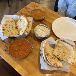 Butter Chicken, Chicken Tikka Masala, Garlic Naan, Cheese Naan and Plain Basmati Rice Butter Chicken, Chicken Tikka Masala, Garlic Naan, Cheese Naan and Plain Basmati Rice