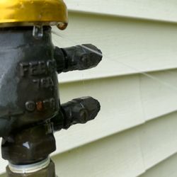 Berardi Irrigation - Improperly installed back flow valve by a Berardi Irrigation tech that is leaking and spraying out water