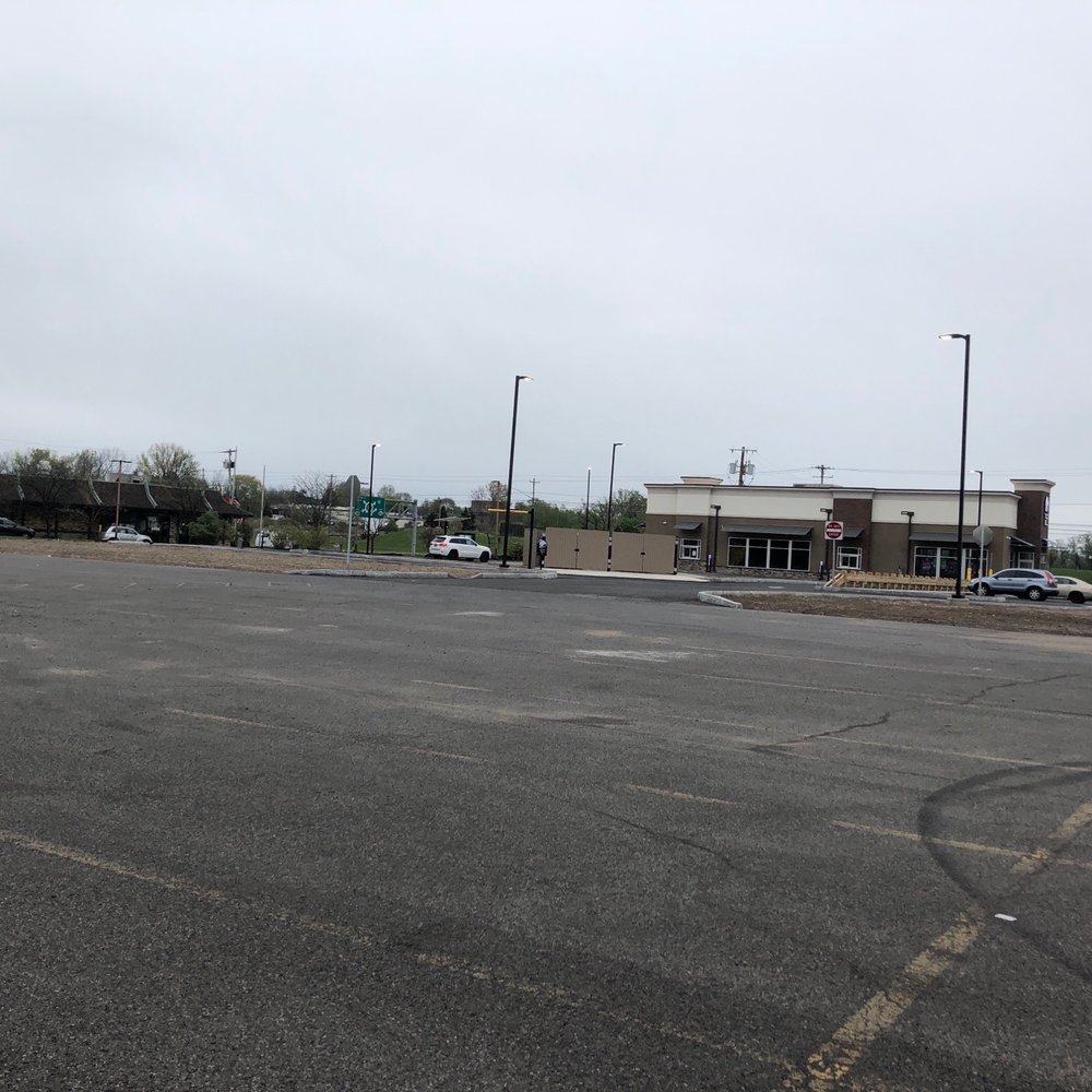 a parking lot with cars parked in it