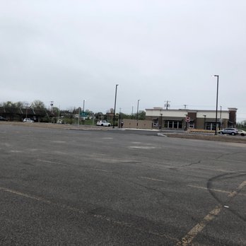 Taco Bell - a parking lot with cars parked in it - Fast Food Near Me - Syracuse, New York