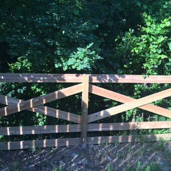 TNT Fences and Decks - Neighbors fence done by a reputable company. Wire on outside posts on inside - Fences & Gates Near Me TNT Fences and Decks - Neighbors fence done by a reputable company. Wire on outside posts on inside - Fences & Gates Near Me