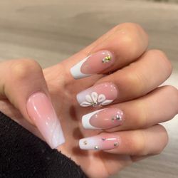 Levue Nails & Spa - Acrylics coffin shape with designs.