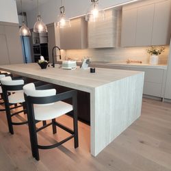 Kitchen Designs and More - Modern Kitchen; Large Island; Waterfalls on Both Sides; Neolith Sintered Stone Countertops and Backsplash including Exhaust Hood