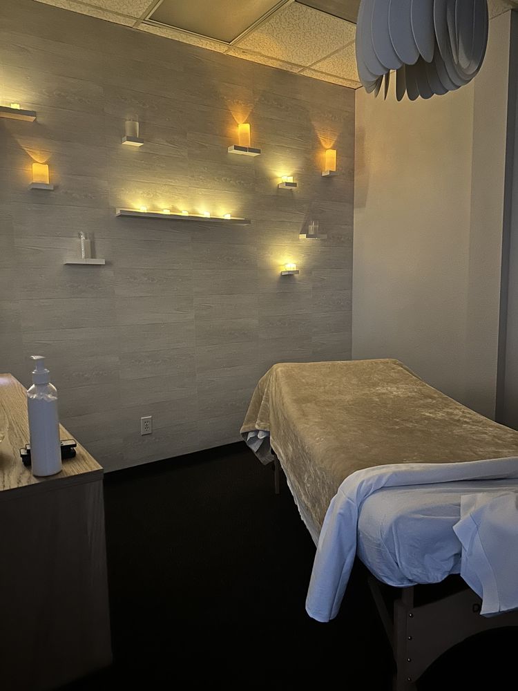 Muscle Therapy and Wellness Logo