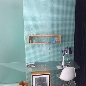 Frame Hotel Treehouse - White Suite desk area - Hotels Near Me - Austin, Texas Frame Hotel Treehouse - White Suite desk area - Hotels Near Me - Austin, Texas