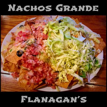 Flanagan's - Strange having lettuce in these nachos. More like a deconstructed taco... :( - American Near Me - Groton, Connecticut
