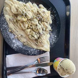 Crepe with Banana and Pistachio and Pistachio ice cream. Crepe with Banana and Pistachio and Pistachio ice cream.