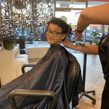 Rico's On 3rd - The silly boy getting a trim - Hair Salons Near Me - Chula Vista, California