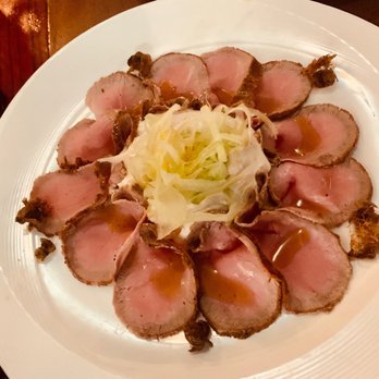 Poesia - Yummy appetizer Vitello Tonnato -Sliced pink roasted veal, salsa tonnata, crunchy celery, fried Sicilian capers - Italian Near Me - San Francisco, California