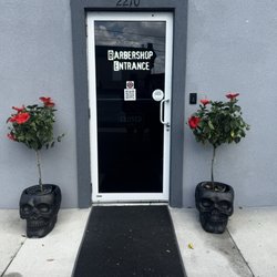 Holiday Barber Shop - Barbershop entrance.