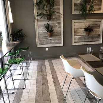 Garden Bistro & Bar - tables and chairs in a restaurant - Cafes Near Me - Orlando, Florida Garden Bistro & Bar - tables and chairs in a restaurant - Cafes Near Me - Orlando, Florida