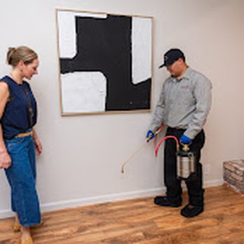 CalPro Pest Control - Technician treating interior wall for pest prevention in home - Pest Control Near Me - Loomis, California CalPro Pest Control - Technician treating interior wall for pest prevention in home - Pest Control Near Me - Loomis, California