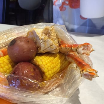 King Crab House - 1 lbs of King crab legs and I lb of shrimp in their house special sauce. Omg yummy! - Cajun/Creole Near Me - Arlington, Texas