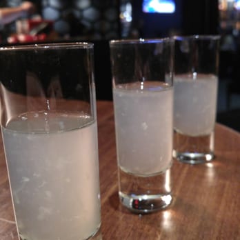 Earls Kitchen + Bar - Smirnoff, lime, and ginger and some bubbly as we walk in the door to wait for a seat. Not a bad way to spend your waiting time! - Canadian (New) Near Me - Woodbridge, Ontario