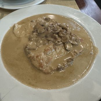 Mi Tierra Latina - Grilled Pork Loin in Mushroom Sauce - Colombian Near Me - Tampa, Florida Mi Tierra Latina - Grilled Pork Loin in Mushroom Sauce - Colombian Near Me - Tampa, Florida