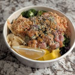 Hinoki Poke - Create your own poke bowl! Half greens half brown rice, edamame, two scoops spicy crab, mango, jalapenos, cucumber, ginger, tuna and salmon!
