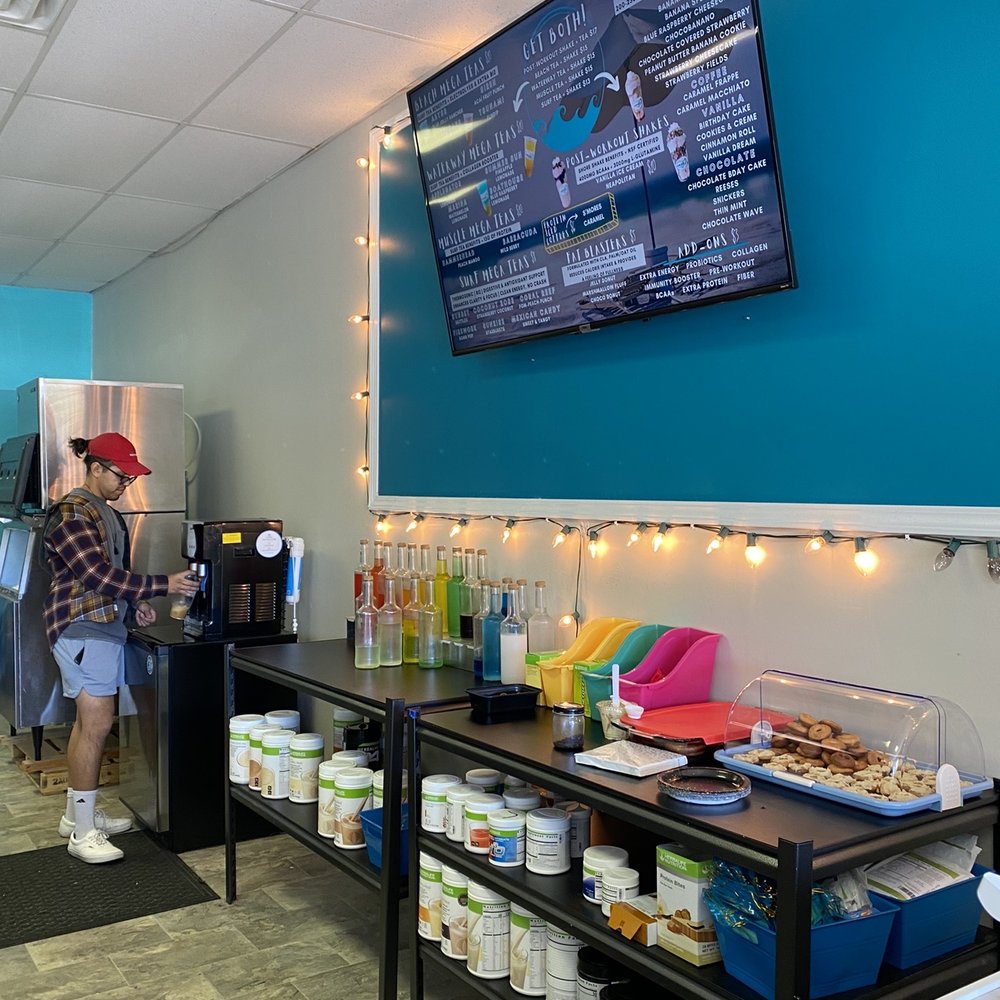 By The Beach Nutrition - a woman preparing food - Juice Bars & Smoothies Near Me - Myrtle Beach, South Carolina By The Beach Nutrition - a woman preparing food - Juice Bars & Smoothies Near Me - Myrtle Beach, South Carolina