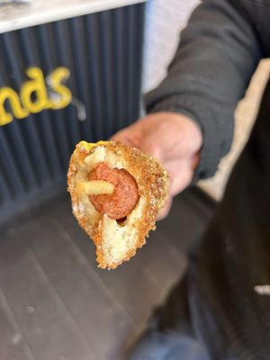 Two Hands Corn Dogs by null