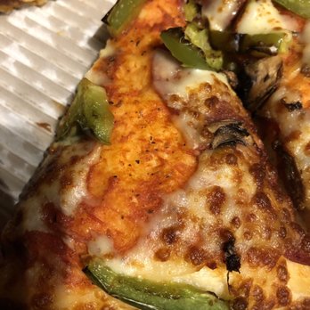 Pizza Hut - a slice of pizza with cheese and peppers - Pizza Near Me - Calgary, Alberta Pizza Hut - a slice of pizza with cheese and peppers - Pizza Near Me - Calgary, Alberta