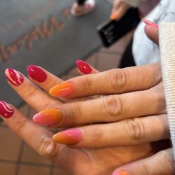 Rose Nail Bar - This was our nails after rose bar nails they did a fabulous job doing them I recommend them to yall