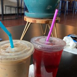 Bear Necessities Coffee & Bar - Vanilla oat milk iced latte 16 ounce and a flavored tea 16 ounce