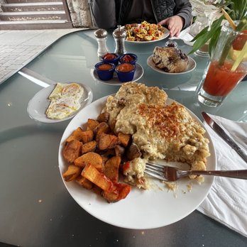 McKay Cottage Restaurant - Biscuits and gravy with potatoes and scramble with blueberry scone. - American Near Me - Bend, Oregon McKay Cottage Restaurant - Biscuits and gravy with potatoes and scramble with blueberry scone. - American Near Me - Bend, Oregon