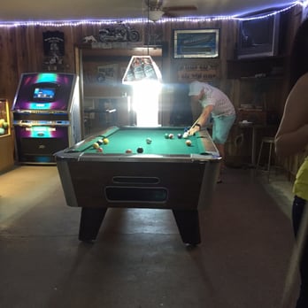 Nutt Corner Bar - a man playing pool - Bars Near Me - Deming, New Mexico