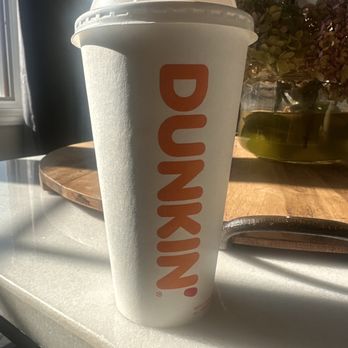 Dunkin' -  a cup of coffee on a table - Coffee & Tea Near Me - East Hanover, New Jersey