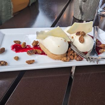 Village Social - Lemon dessert with shortbread cookies and candied pistachios with raspberry sauce - New American Near Me - Asheville, North Carolina Village Social - Lemon dessert with shortbread cookies and candied pistachios with raspberry sauce - New American Near Me - Asheville, North Carolina