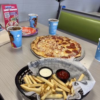 Chuck E. Cheese - Large pizza and fries - Pizza Near Me - Grapevine, Texas Chuck E. Cheese - Large pizza and fries - Pizza Near Me - Grapevine, Texas