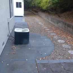 Before shot, we wanted to remove that shed in the back and you can see the retention wall failing.