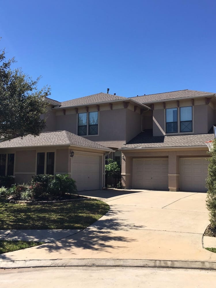 Slide of Houston Roofing & Construction