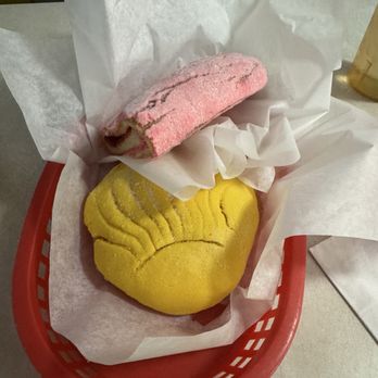 Joe's Bakery & Coffee Shop - Pastries - pink one was like a concha (the yellow) with strawberry jam filling - Mexican Near Me - Austin, Texas