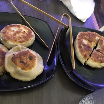 Everyday Noodles - Left Crispy Pork Buns and Right Crispy Green Onion Pancake - Chinese Near Me - Pittsburgh, Pennsylvania Everyday Noodles - Left Crispy Pork Buns and Right Crispy Green Onion Pancake - Chinese Near Me - Pittsburgh, Pennsylvania