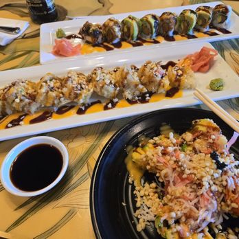 Ritz Bento - Monkey Brains on black plate. The plate in the middle is their Angry Wife Roll. Then you have the Red Wolf Roll pictured at the back. - Ramen Near Me - Texarkana, Texas Ritz Bento - Monkey Brains on black plate. The plate in the middle is their Angry Wife Roll. Then you have the Red Wolf Roll pictured at the back. - Ramen Near Me - Texarkana, Texas