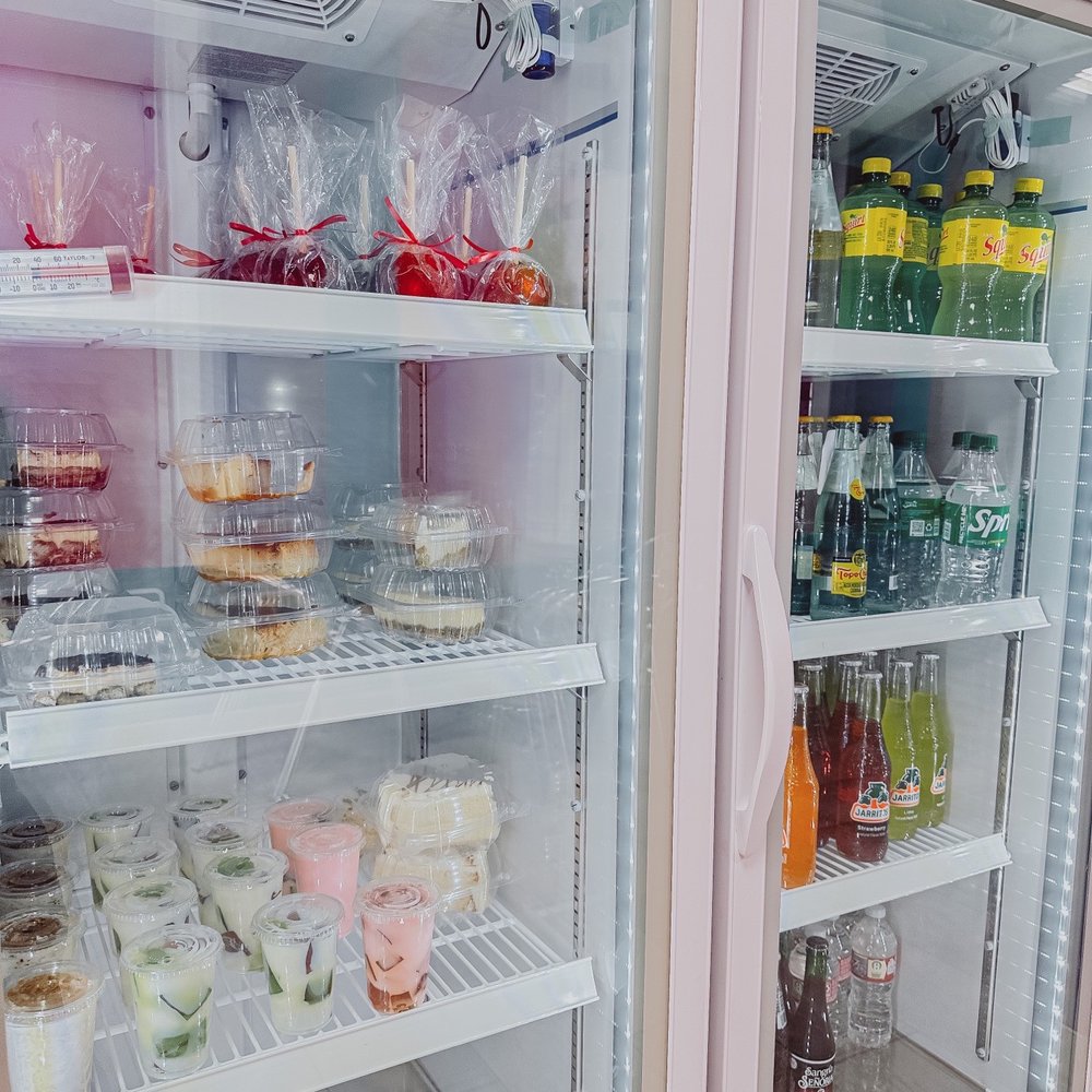 El Rincon - a refridgerator filled with drinks - Ice Cream & Frozen Yogurt Near Me - Pearland, Texas